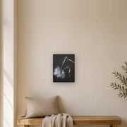 The night did not keep him canvas print by Artis Berkmanis, the white outline of a horse's head, its breath turning to mist on a black background. Shown at 23 x 30 cm in a Scandinavian hallway.