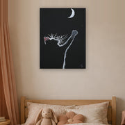 At least I tried canvas print by Artis Berkmanis, a white kitten reaching for a crescent moon on a black background. Shown at 61 x 81 cm in a Scandinavian children's room.