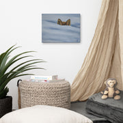 I am not lost, only hiding canvas print by Artis Berkmanis on a bedroom wall above a bed, beside a plant