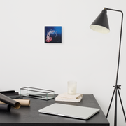 Beauty that must not be touched canvas print by Artis Berkmanis on a light wall above a desk with a black floor lamp